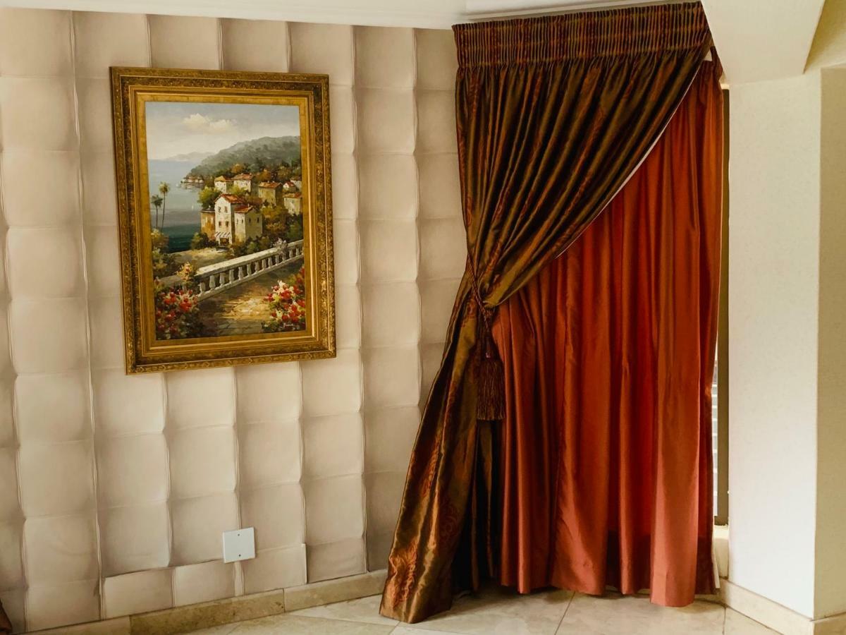 Bella Casa Guesthouse Йоханнесбург Экстерьер фото